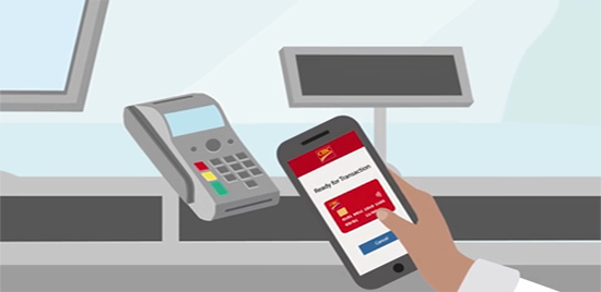 A customer uses a smartphone to pay for groceries.