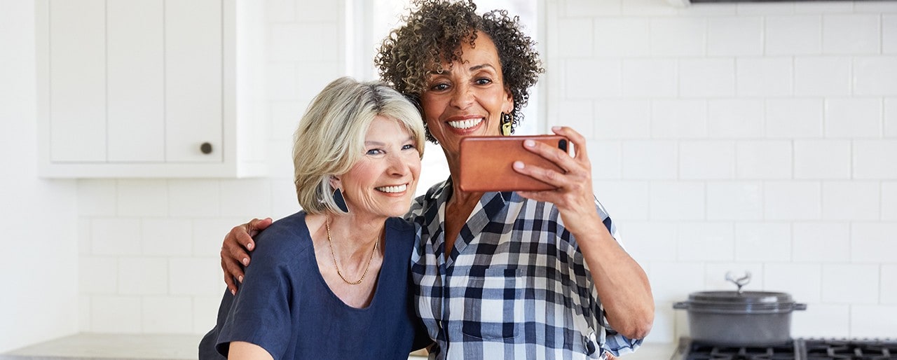 Two friends take a selfie.