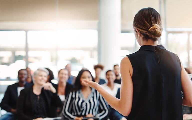 A diverse group of people around a boardroom table