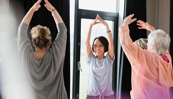 Retirees attending an exercise class