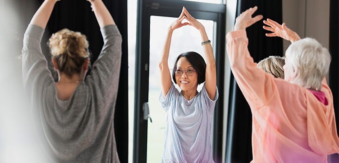 Retirees attending an exercise class