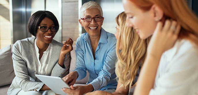 a group of women having a discussion