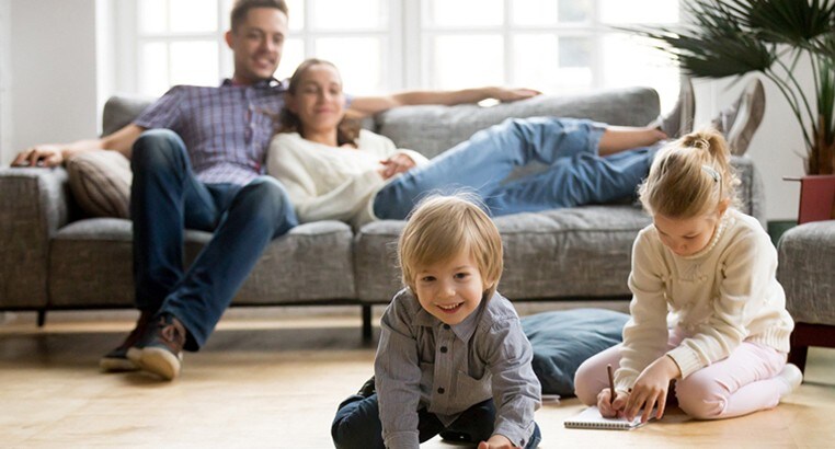Parents watching their kids play