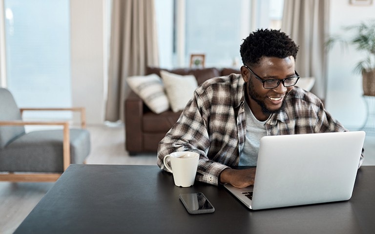 Woman on her computer at home