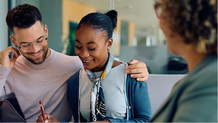 Happy person checks their digital vault on a laptop