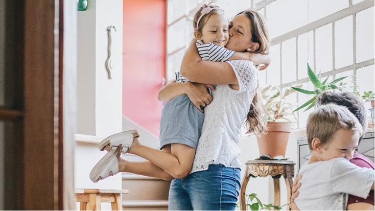 Happy person checks their digital vault on a laptop