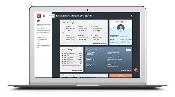 Laptop displaying the CIBC SmartBanking dashboard