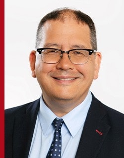 Mark W. Podlasly.