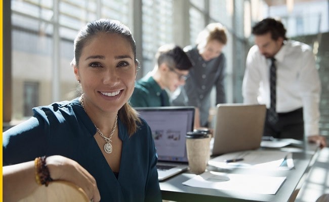 Employees chatting in a meeting