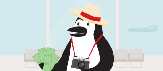 Percy Penguin holds a handful of American dollars