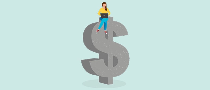 Woman with laptop sits on a dollar sign