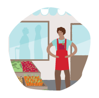 Grocery retailer looks at his produce