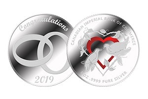 2019 Wedding coin. One side features two connected rings with the words “Congratulations” and “2019”. The other side has two birds, a heart and a heart-shaped vine.