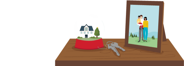 A snow globe, keys and framed picture of a family.