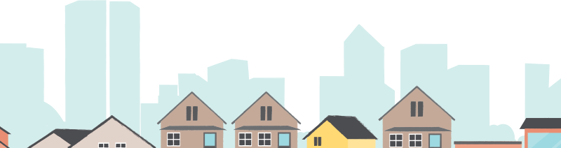 Maisons avec immeubles en arrière-plan.
