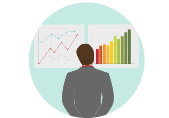 Man looking at graphs
