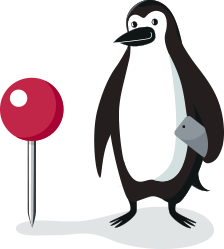 Percy Penguin standing next to a location marker with a phone in his hand.