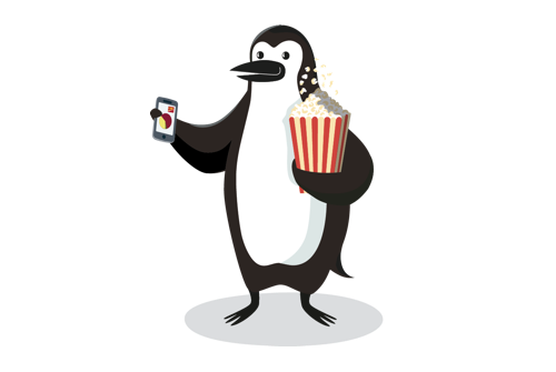 Percy Penguin holding a bag of popcorn and a smartphone